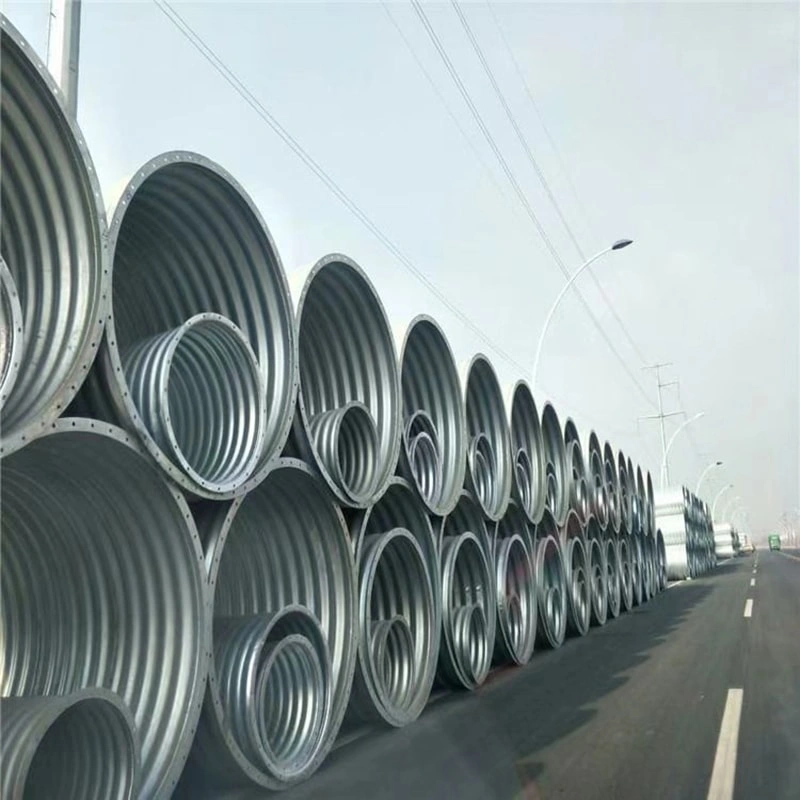 First, the steel plates are carefully inspected upon arrival at the factory. The corrugated steel plates must comply with national regulations, with the waveform and waveform spacing strictly adhering to the design drawings. The length and width are determined based on dimensions, as well as lifting, transportation, and assembly conditions. The corrugated steel pipes, high-strength bolts, and nuts must undergo galvanized anti-corrosion treatment before leaving the factory. Each batch of goods is inspected and accompanied by product certificates. Second, during the transportation and handling of metal corrugated pipe culverts, extra caution must be exercised. Rolling or impacting hard objects is strictly prohibited to prevent deformation of the corrugated pipe walls or damage to the galvanized layer. Third, after arriving at the construction site, the dimensions of each piece must be inspected. A random sample of plates and high-strength bolts from the metal corrugated pipe culvert should be selected for testing, including checks on dimensions, corrosion resistance, strength, and other relevant items. The test results must comply with national requirements. Fourth, after inspection, store the materials in a well-ventilated and spacious area. Protective measures should be taken to prevent the metal corrugated pipes from being soaked by rainwater, which could cause deformation. First, the steel plates are carefully inspected upon arrival at the factory. The corrugated steel plates must comply with national regulations, with the waveform and waveform spacing strictly adhering to the design drawings. The length and width are determined based on dimensions, as well as lifting, transportation, and assembly conditions. The corrugated steel pipes, high-strength bolts, and nuts must undergo galvanized anti-corrosion treatment before leaving the factory. Each batch of goods is inspected and accompanied by product certificates. Second, during the transportation and handling of metal corrugated pipe culverts, extra caution must be exercised. Rolling or impacting hard objects is strictly prohibited to prevent deformation of the corrugated pipe walls or damage to the galvanized layer. Third, after arriving at the construction site, the dimensions of each piece must be inspected. A random sample of plates and high-strength bolts from the metal corrugated pipe culvert should be selected for testing, including checks on dimensions, corrosion resistance, strength, and other relevant items. The test results must comply with national requirements. Fourth, after inspection, store the materials in a well-ventilated and spacious area. Protective measures should be taken to prevent the metal corrugated pipes from being soaked by rainwater, which could cause deformation.